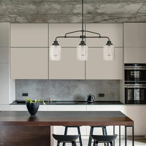 Annecy Rustic Dark Bronze Pendant Light With Seeded Glass Shades Adjustable Three 9.84 Inch Rods Bulb Not Included Farmhouse Vibe Ceiling Fixture Perfect For Kitchens And Dining Areas hanging over modern kitchen island.