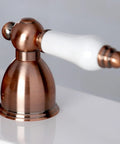 Close-up of Restoration Mini Widespread Lavatory Faucet handle with porcelain lever, polished chrome finish, solid brass.