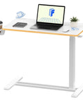 32 Inch Mobile Standing Desk Featuring A Slick Rolling Base And Hassle Free Pneumatic Height Adjustments With Smooth One Hand Gas Spring Lift For Compact Home Office Computer Workstation Setup with laptop and coffee cup.
