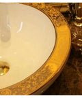 Close-up view of the USZWBY Bathroom Vessel Sink, Basin Sink Golden Edge Artistc Porcelain Countertop thick wall with decorative gold rim.