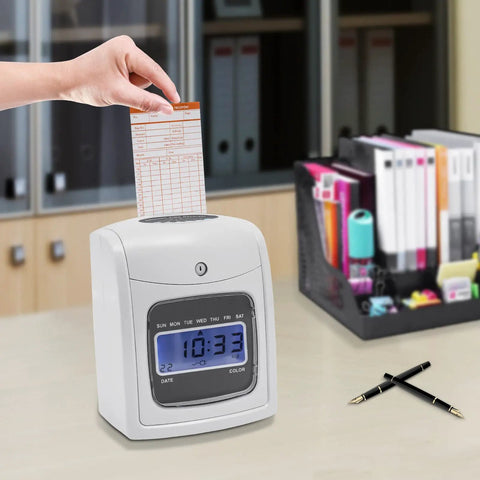 Built Tough Wall Mount Or Desk Time Clock Bundle With Bright Lcd Screen, punch card being inserted, office setting.
