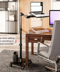 G2 Deluxe Adjustable Laptop Stand With Rolling Computer Desk for Bed or Sofa or Office holding a laptop beside a desk