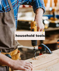 Person drilling into wood with a hand drill in a workshop, surrounded by various tools, clamps, and household tools sign.