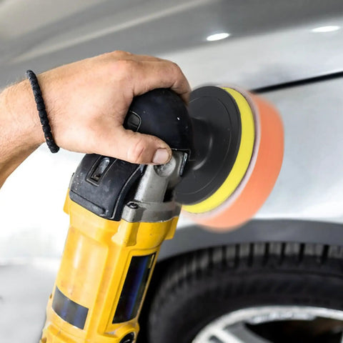 Hand using 10 Pack Car Polishing Pads 3 Inch Foam Buffing Pads For Drill With M10 Adapter on car exterior