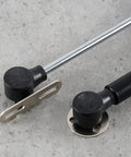 Gas Spring Cabinet Door Hinge For Kitchen Cabinets, Hydraulic Soft Close Support, metal and black components on a table.