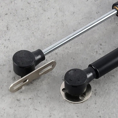 Gas Spring Cabinet Door Hinge For Kitchen Cabinets, Hydraulic Soft Close Support, metal and black components on a table.