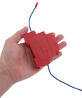 Slick Automatic Fire Extinguisher Sticker For Car Engine Bays And Garages Plug And Play Aerosol Safety Patch held in hand.