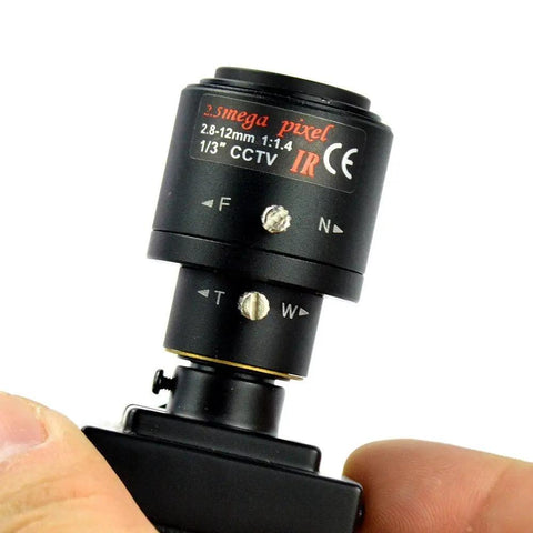 Compact Bullet Security Camera 960H 1000TVL HD With 2.8 To 12mm Varifocal Lens close-up, indoor surveillance setup