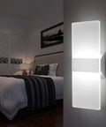 12W LED Wall Sconce Pack Up And Down Lighting 6000K Cool White Indoor Acrylic Fixture in bedroom setting view.