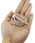 Person holding a Pair Of Marine Grade Stainless Steel 316 Quick Lock Release Trailer Towing Coupler Safety Pin 4.5mm Diameter 50mm Length