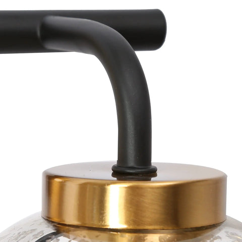 Close-up of Modern Vanity Light Over Mirror With Mercury Glass Shades In Black And Gold Finish For Bathroom