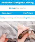 Clear Magnetic Duvet Clips with Magnetic Key for Easy Removal Pack of 8 Safe Locking Comforter Fasteners in use on bedding.