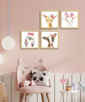 Framed Woodland Nursery Wall Decor 10x10 Inch Cute Baby Wall Art For Kids Safari Animals Artwork Prints 4 Pack Playroom Bedroom Baby Shower Decoration in pink room.