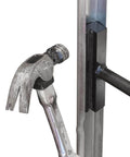 Vertical Track Repair Tool Set for Garage Doors with Heavy Duty Anvil Tools Exclusively Designed for 2 Inch Roller Track Rails Maintenance and Replacement Kit to Keep Doors Smooth Quiet and Easy to Access for DIY Homeowners showing steel tool on metal rail.