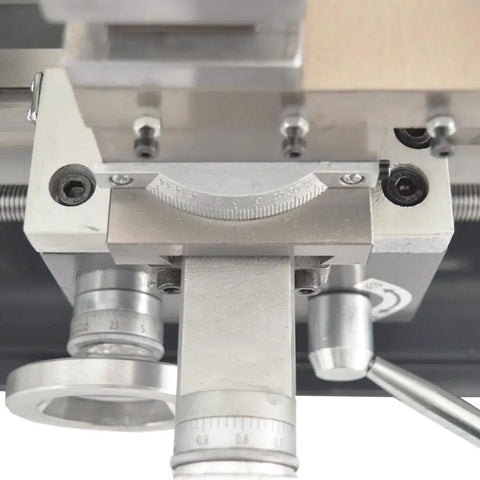 Close-up view of Compact Metal Bench Lathe Featuring A Beefy 8X16 Inch Bed And Mt5 Taper powered by a 900W motor.