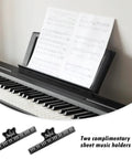 Sturdy Piano Keyboard Stand With Clips, Plastic Sheet Music Holder For Piano And Digital Keyboards shown with sheet music on a piano