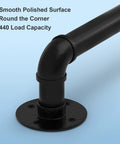 Close-up of a 14 Ft Heavy Duty Pipe Stair Handrail Built Like A Tank Black Metal Railing with polished surface and corner joint design.