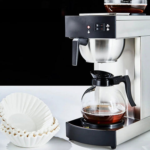 Coffee maker with glass carafe and stack of Large Flat Bottom Coffee Filters Tall Walled 9.75 Inch Wide 4.25 Inch Tall 2.75 Inch Sides