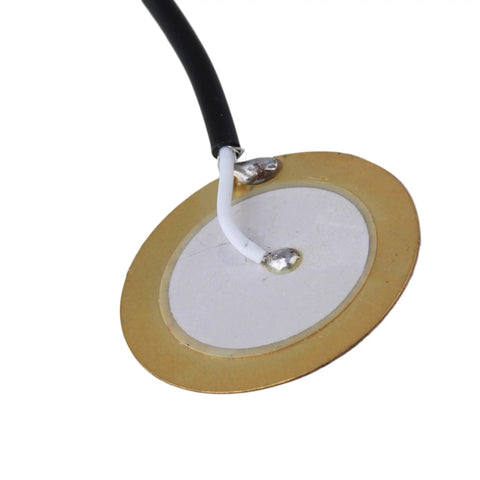 Close-up of one 27mm sensor from the 3 Pack Piezo Guitar Pickup Transducers With 0.25 Inch Output Jack For Guitar And Violin
