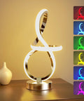 Modern Spiral Music Note Table Lamp With 7 RGB LED Colors Touch Control Dimmable Nightstand Light on a wooden table