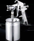 Badass Pneumatic Spray Gun With One Point Five Mm Nozzle W Seven One Model for auto paint and furniture finishing with a silver body.