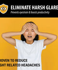 Person experiencing headache from fluorescent lights, highlighting the need for Fluorescent Light Covers For Ceiling Lights 4 Pack Magnetic 2x4 Ft Glare Reduction For Classroom And Office Autumn Leaves Design Easy Magnetic Installation To Boost Focus And Boss Level Productivity.