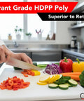 Pro Grade Commercial Plastic Cutting Board With Large 18 By 12 By Half Inch Thick White Poly Surface in a kitchen setting.