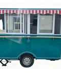Rollout Ready Custom Towable Food Trailer Commercial Mobile Catering Kitchen With Insulated Walls Heavy Duty Chassis And Turnkey Layout, front view with large windows.