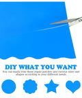 Scissors cutting Blue Rectangle Patch Vinyl Liner Repair Kit for above ground pools, showcasing customizable shapes.