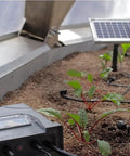 Solar Powered Automatic Drip Irrigation System with 50 Drippers and 155 Feet of Tubing installed in a raised bed garden