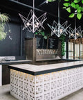 Bar counter with Breeze Brick Molds For Concrete, Double Square Design; decorative wall tiles, outdoor setting, ambient lights