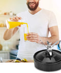 Man pouring juice with 7 Fins Blender Blade Replacement Kit Pro Grade With Silicone Gasket Ring in foreground