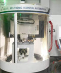 Jarrow Tool CNC milling machine with Helitronic Essential Automation branding, enclosed work chamber and control panel.