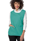 Heavy Duty Cobbler Apron 3 Pack For Men And Women In Bold Surgical Green, model wearing apron, features deep pockets.