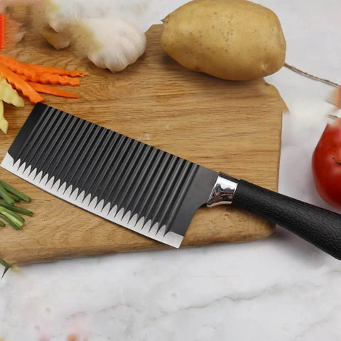 Ciieeo stainless steel crinkle potato cutter with black textured handle on wooden cutting board
