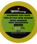 Close-up of a Forney 2 oz soldering flux paste container with green label, used for neat joints in metalwork.