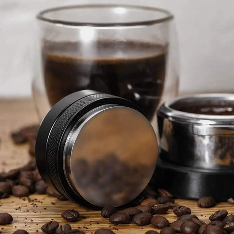 51mm Espresso Tamper And Distributor Dual Head Coffee Leveler near glass of coffee and beans, for Delonghi 51mm portafilter