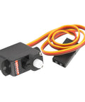 Slick Compact 2G Digital Servo With Rock Solid Torque And Sick Power Coreless Motor Knockout Upgrade For Remote Control Cars Airplanes Helicopter Rigs Precision Steering, showing black micro servo with orange and yellow wires.