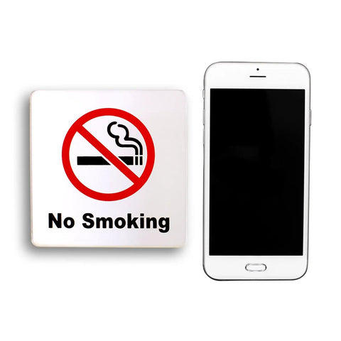 Two Pack No Smoking Sign 4x4 Acrylic Classic With Self Adhesive Rust Free For Cars Offices Restaurants Indoor Or Outdoor Use High Contrast Red Black Silver For Clear Visibility next to smartphone.