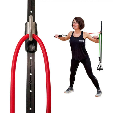 Woman using Space Saving Wall Mount Gym Anchor System With 4 Stackable Resistance Bands adjustable rail for workouts.