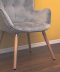 Gray chair on wooden floor with No Slip Rubber Feet For Furniture 20 Pieces With Stainless Steel Screws Anti Skid Pads Protect Floors And Boost Stability For Tables And Chairs Easy To Install And Keep Floors Scratch Free