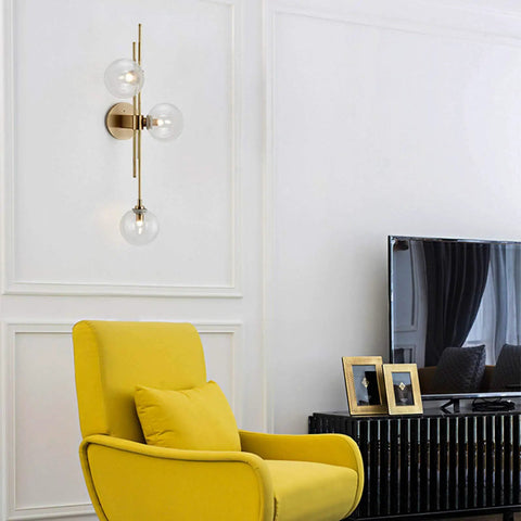 Three Light Modern Wall Sconce With Clear Glass Globe And Gold Base For Bedside Or Living Room Sleek Gold Wall Lamp Delivers Warm Ambient Glow And Contemporary Decor