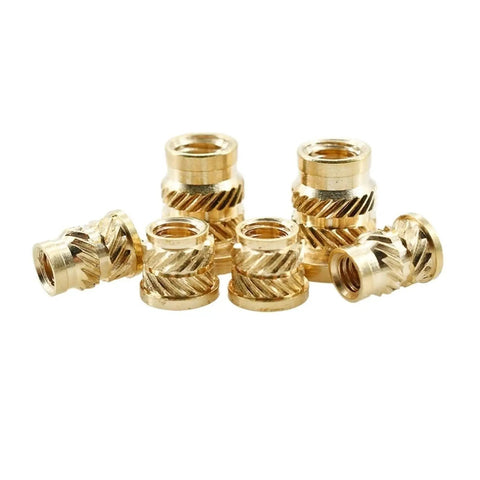 Bulk 300 Pack M1.6 Knurled Heat Threaded Inserts For 3D Printing, brass nuts arranged in a group, close-up view