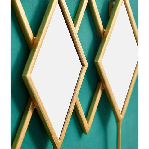 Dang Solid Wall Mount Coat Hook Featuring Heavy Duty Wrought Iron Craft With A Slick Rustic Copper And Gold Finish on teal wall.