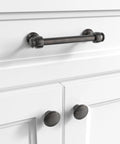 Milano Door And Drawer Pull 8 Inch Center-To-Center in Oil Rubbed Bronze installed on white cabinet.