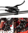 ZOOM HB-876E 4-piston hydraulic e-bike brake kit; black calipers, 180mm rotors, mounted on carbon bar and red frame.