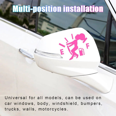 Slick Humorous Waterproof Fuel Tank Cap Decals on white car side mirror, displaying fun pink design, universal for various surfaces.