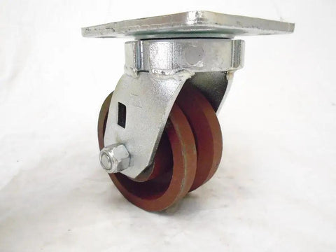Super Tough Heavy Duty 4X2 Swivel Caster Set Kingpinless Roller Bearing V Groove Dolly Wheels close-up view of brown rubber wheels.