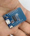 Close-up of Five Pack D1 Mini NodeMCU ESP8266 ESP-12F WiFi Dev Board Bundle for Arduino IDE and WeMos D1 Mini in hand