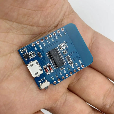 Close-up of Five Pack D1 Mini NodeMCU ESP8266 ESP-12F WiFi Dev Board Bundle for Arduino IDE and WeMos D1 Mini in hand